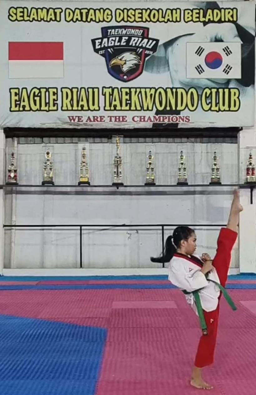 Ifrassel Cinta Maheswari Siswi SDN 36 Pekanbaru Raih Medali Emas di Event Online Taekwondo Internasional Champion